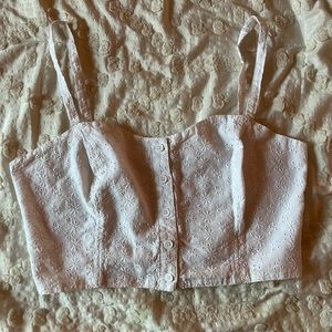 White, sleeveless eyelet crop top